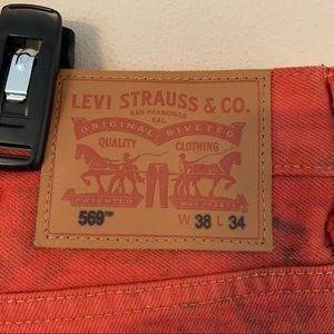 Men’s grunge splatter paint Levi’s 569 jeans